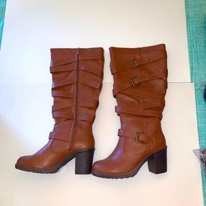 Brown knee high boots with straps. Size 9.